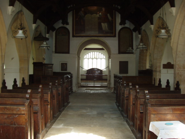 Photo of interior of church showing knave and altar.
