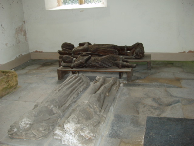 Photo of north transept containing 4 tombs